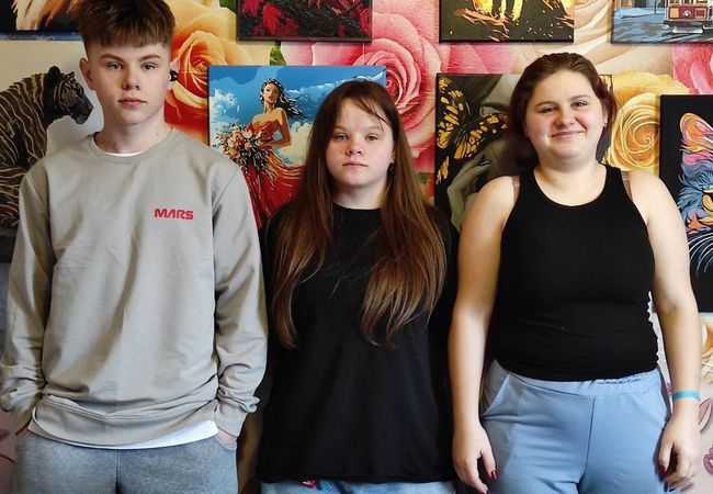 Oleksandra, Anatolii und Nina Romanenko