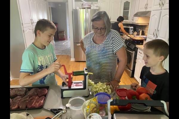 Full house: Barrie woman opens home to refugee family of 13