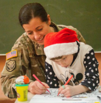 New York Army National Guard Soldiers deployed to Ukraine visit local orphanage